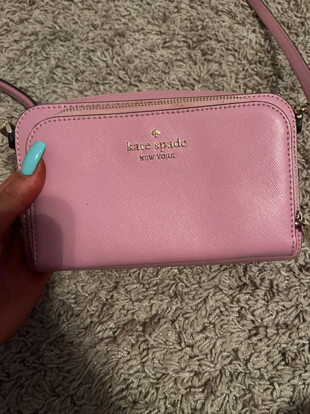 Kate Spade pink leather crossbody with gold logo